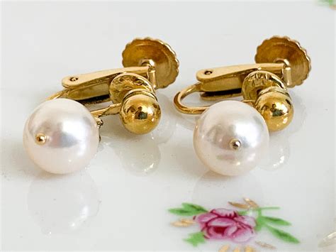 real pearl earrings gold.